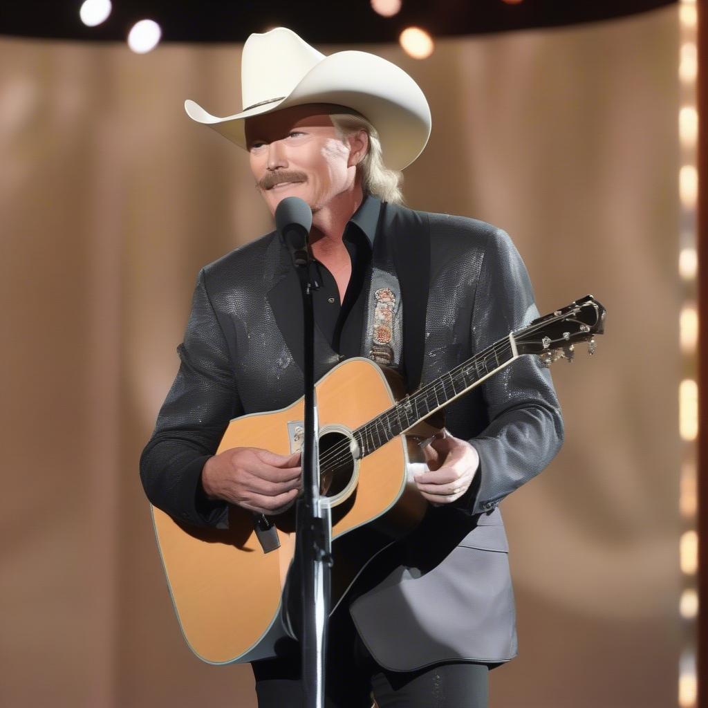 Alan Jackson receiving a music award on stage