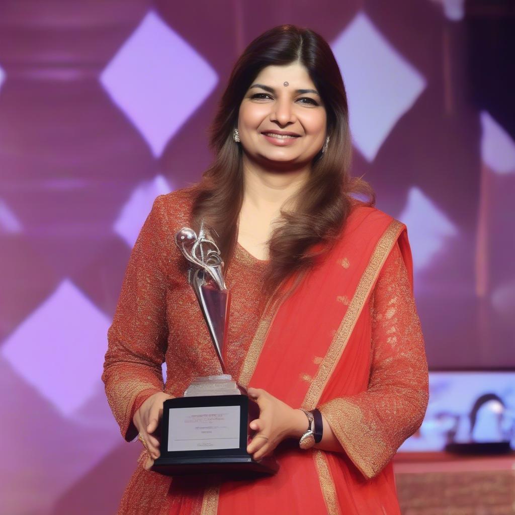 Alka Yagnik Receiving a Music Award