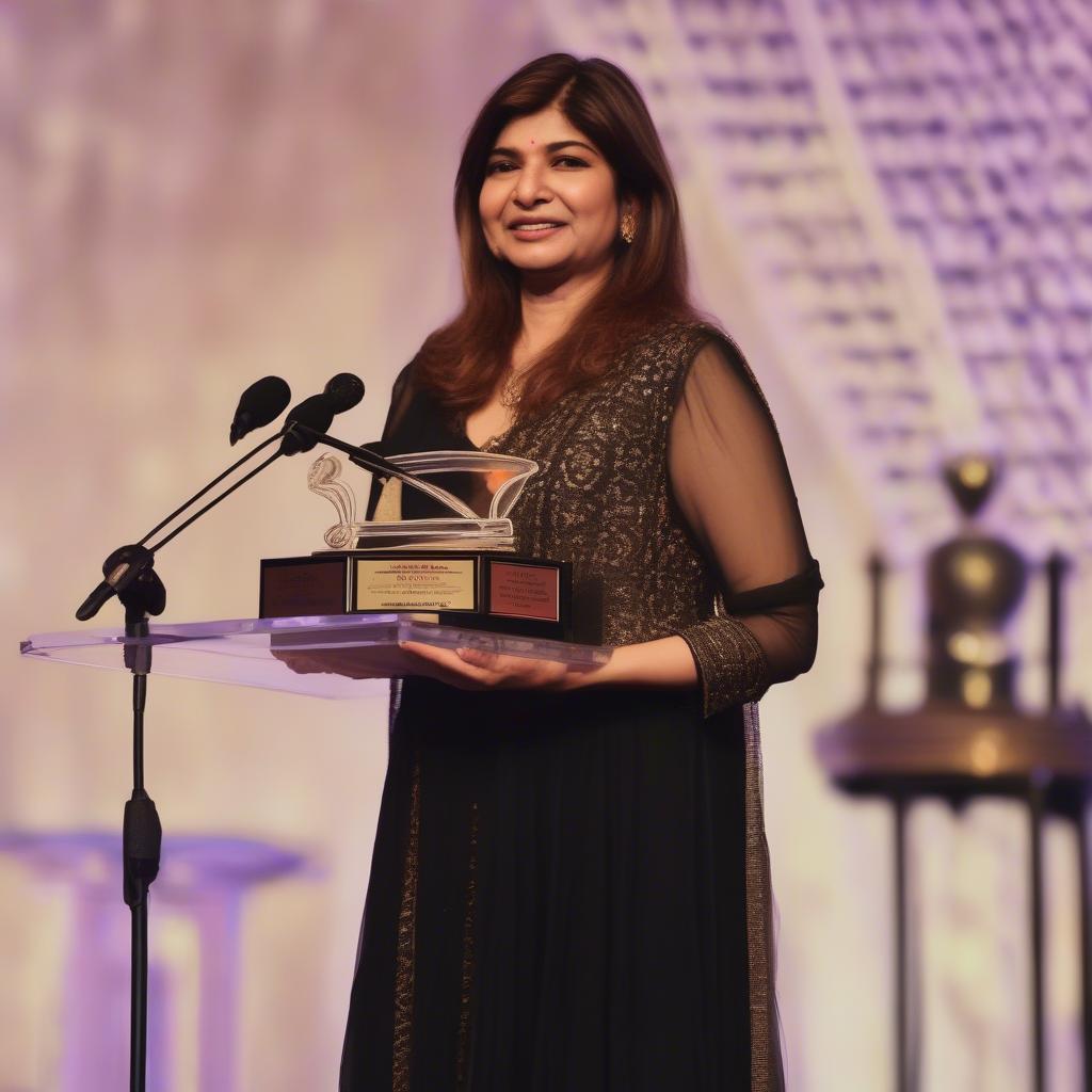 Alka Yagnik Receiving an Award at a Music Ceremony