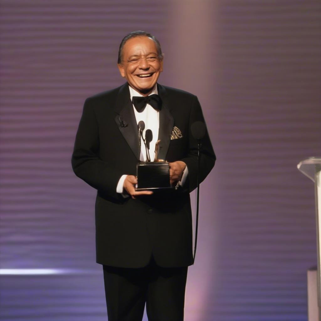 Armando Manzanero accepting a prestigious music award