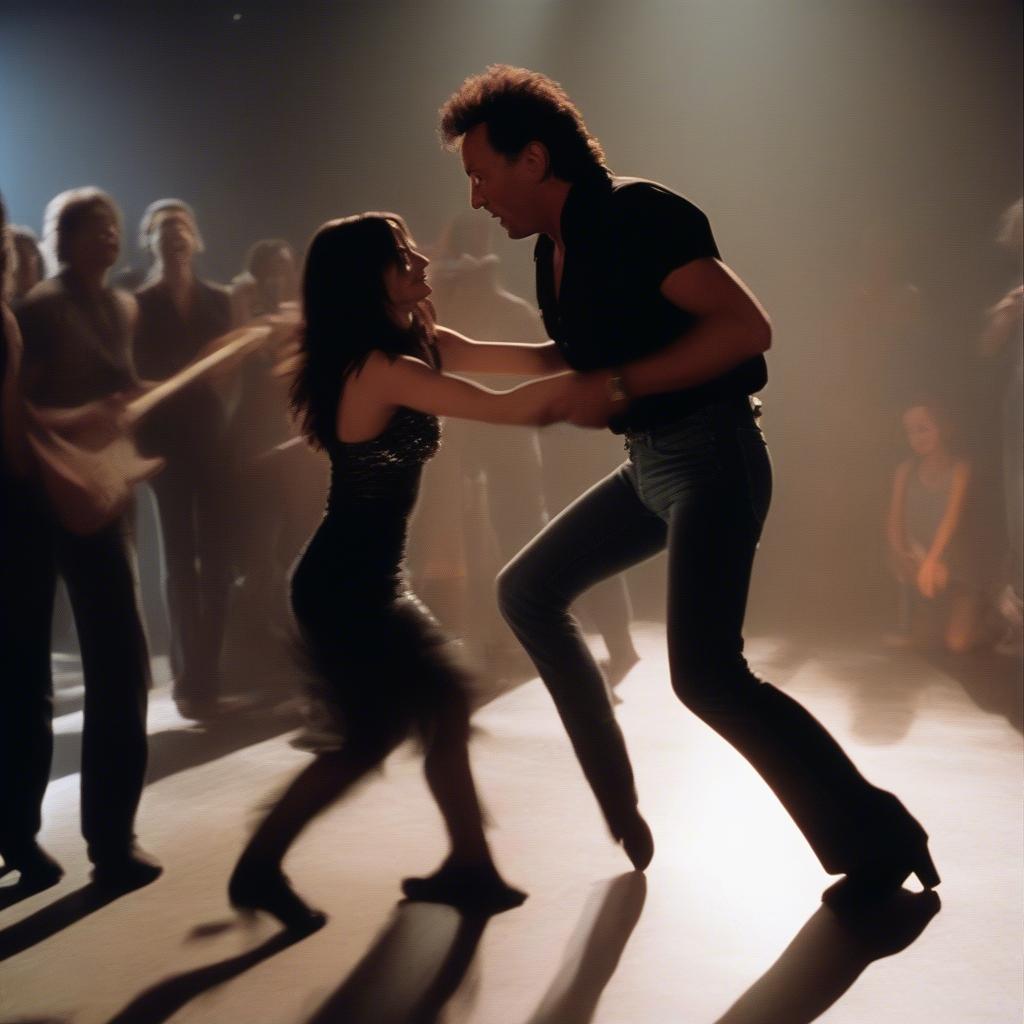 Bruce Springsteen dancing with Courtney Cox in the iconic music video for "Dancing in the Dark".