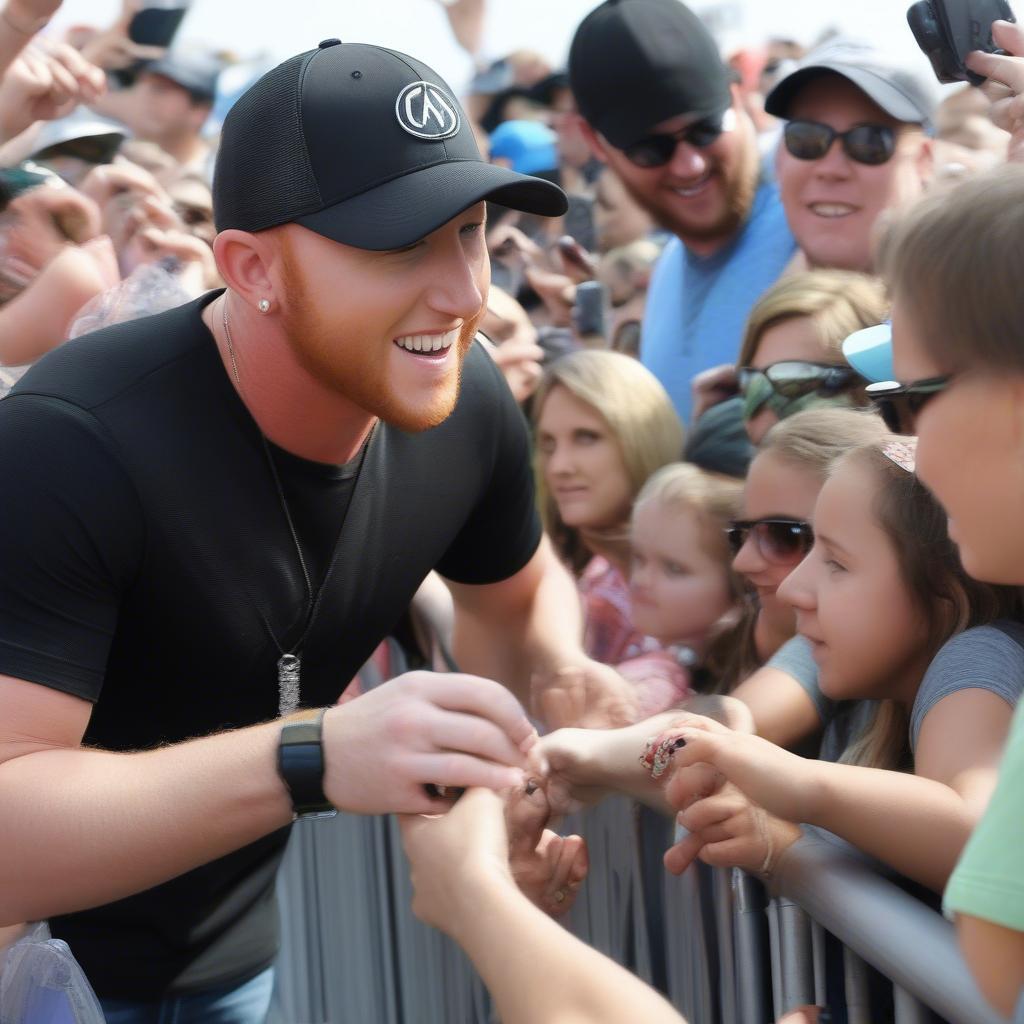 Cole Swindell meeting and interacting with fans at a meet-and-greet event