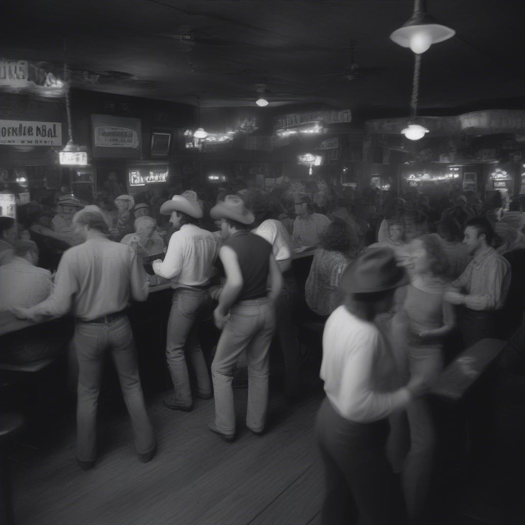 Honky Tonk Bars in 1984: A black and white photo of a dimly lit honky-tonk bar with patrons dancing and a band playing on stage.