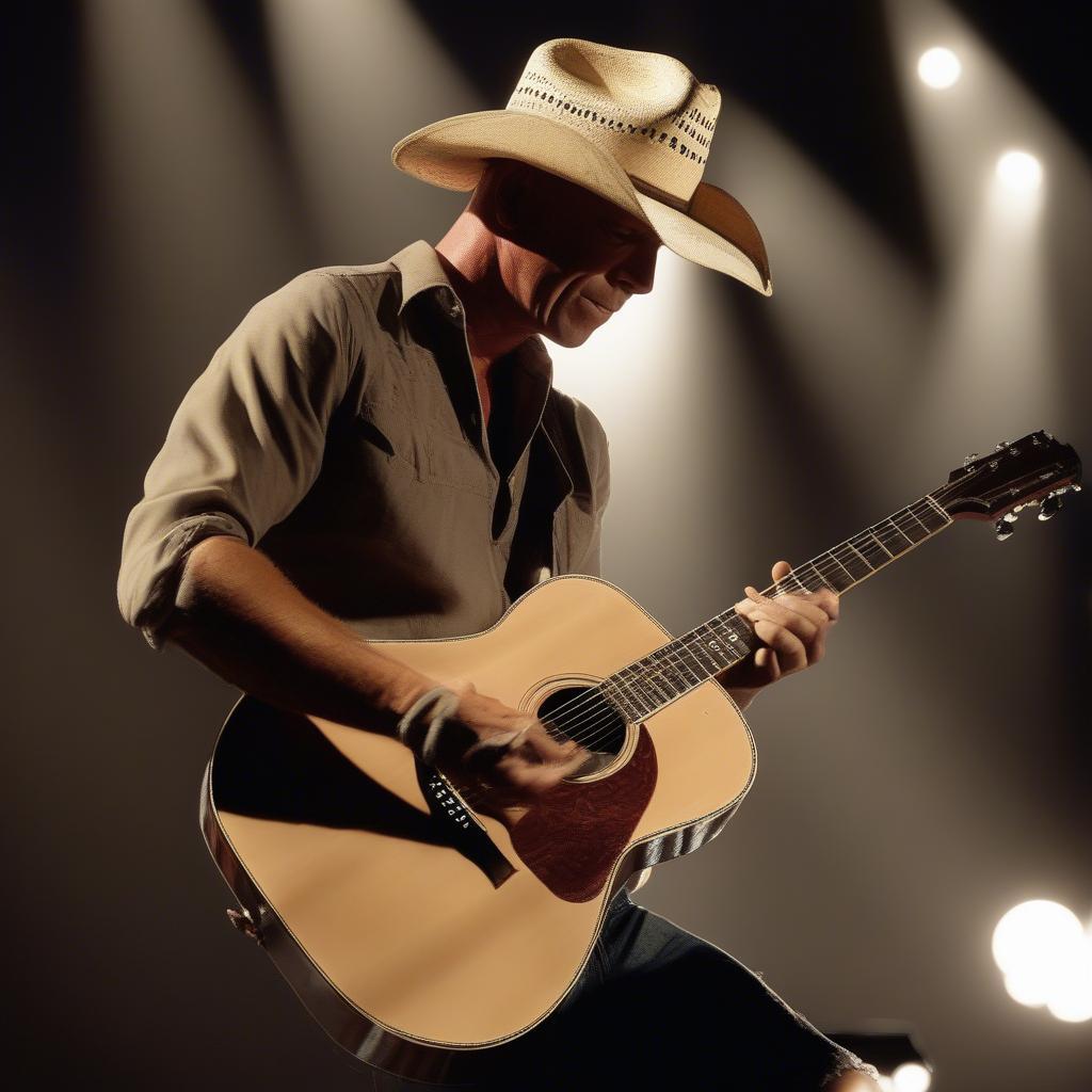 Kenny Chesney playing guitar on stage