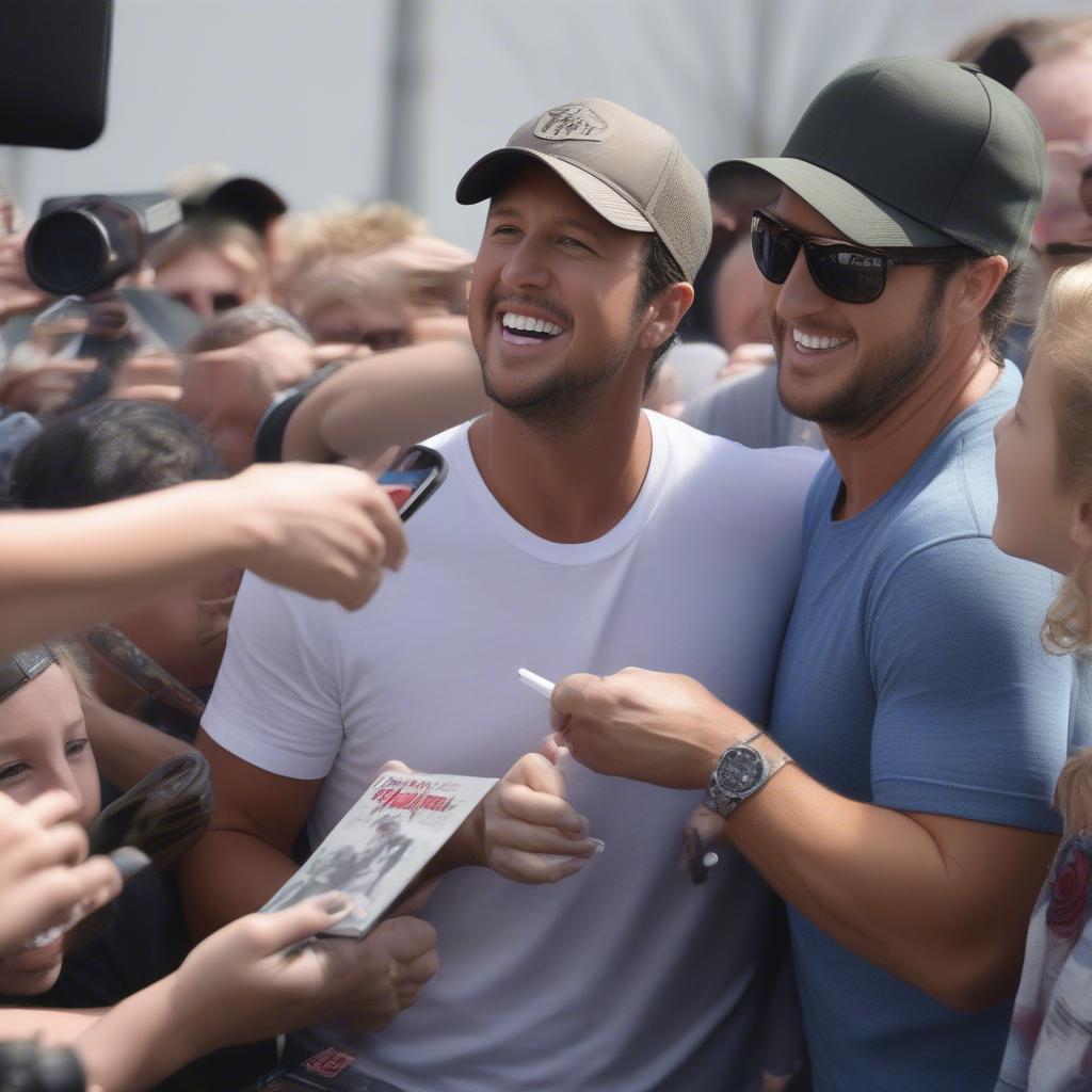 Luke Bryan interacting with fans, signing autographs and taking pictures