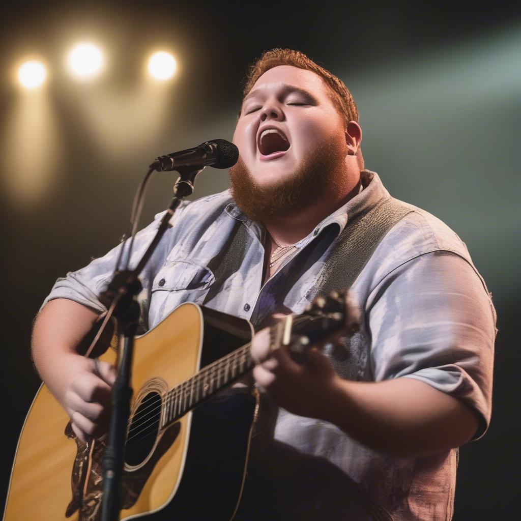 Close-up of Luke Combs singing "Beautiful Crazy" with emotion, possibly during a live performance.