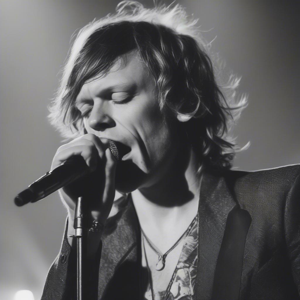 Matt Shultz Singing Passionately into a Microphone