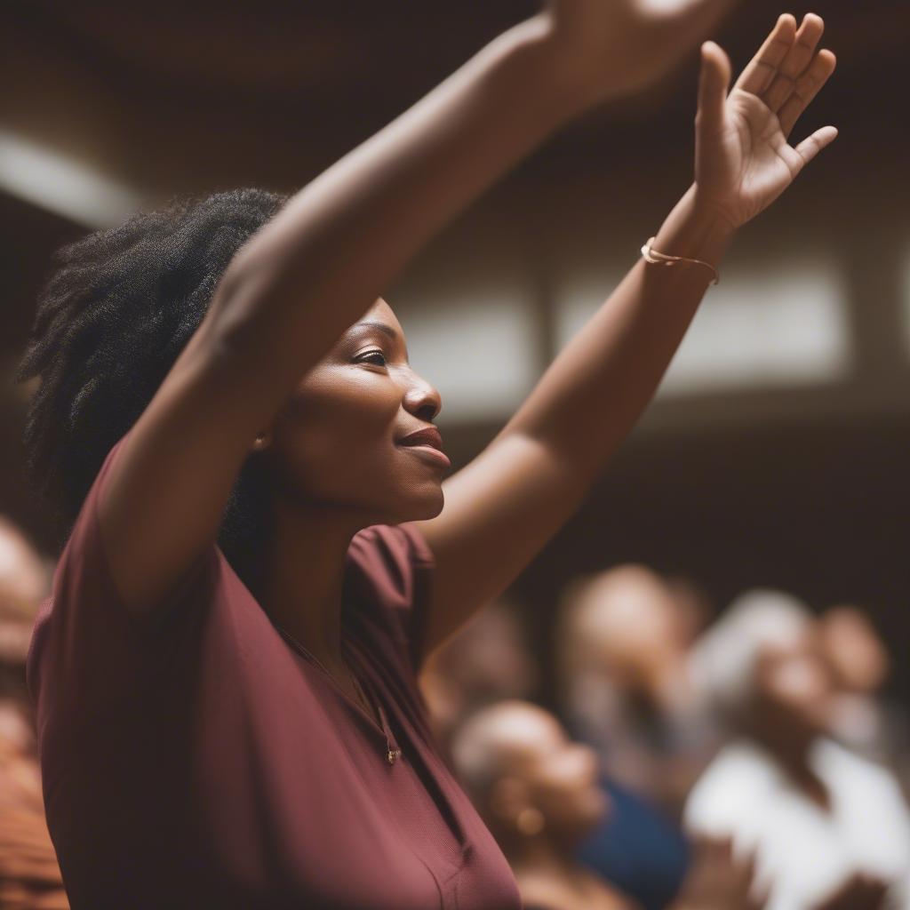 Woman Raising Hands in Worship