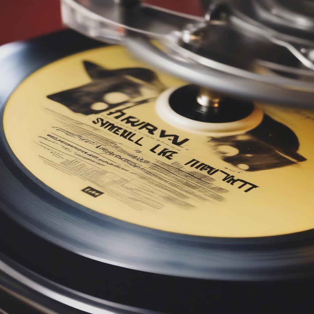 A vinyl record of Nirvana's "Smells Like Teen Spirit" spinning on a turntable.