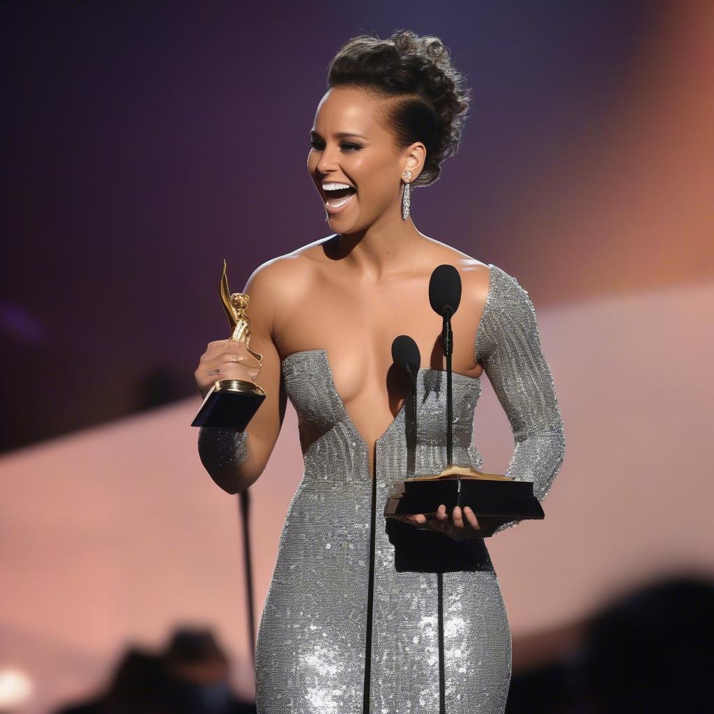 Alicia Keys receiving a music award on stage, smiling and holding the trophy, acknowledging the recognition for her musical achievements