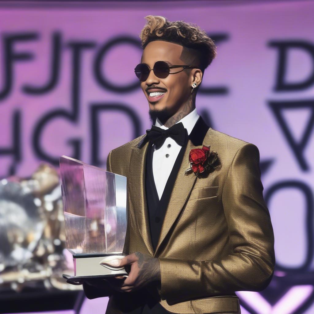 August Alsina accepting a music award on stage.