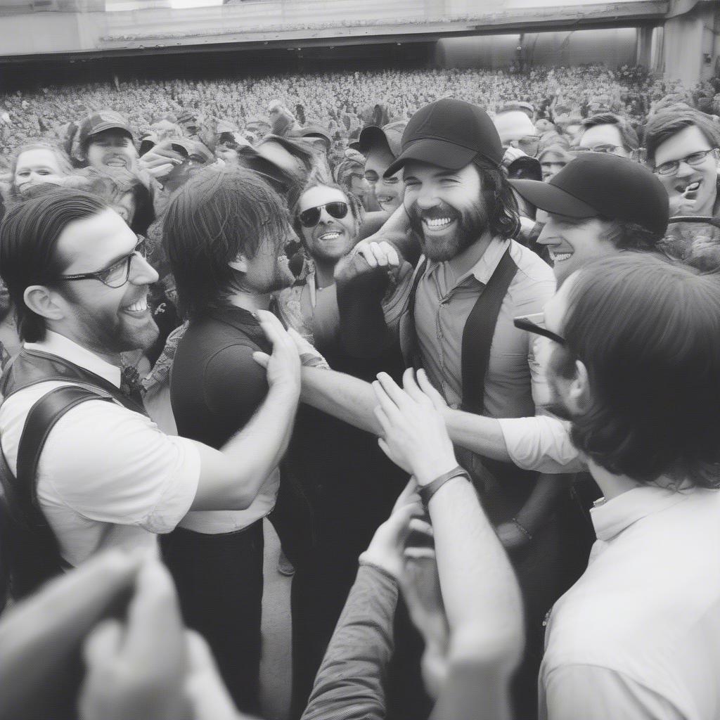 The Avett Brothers meeting fans after a concert