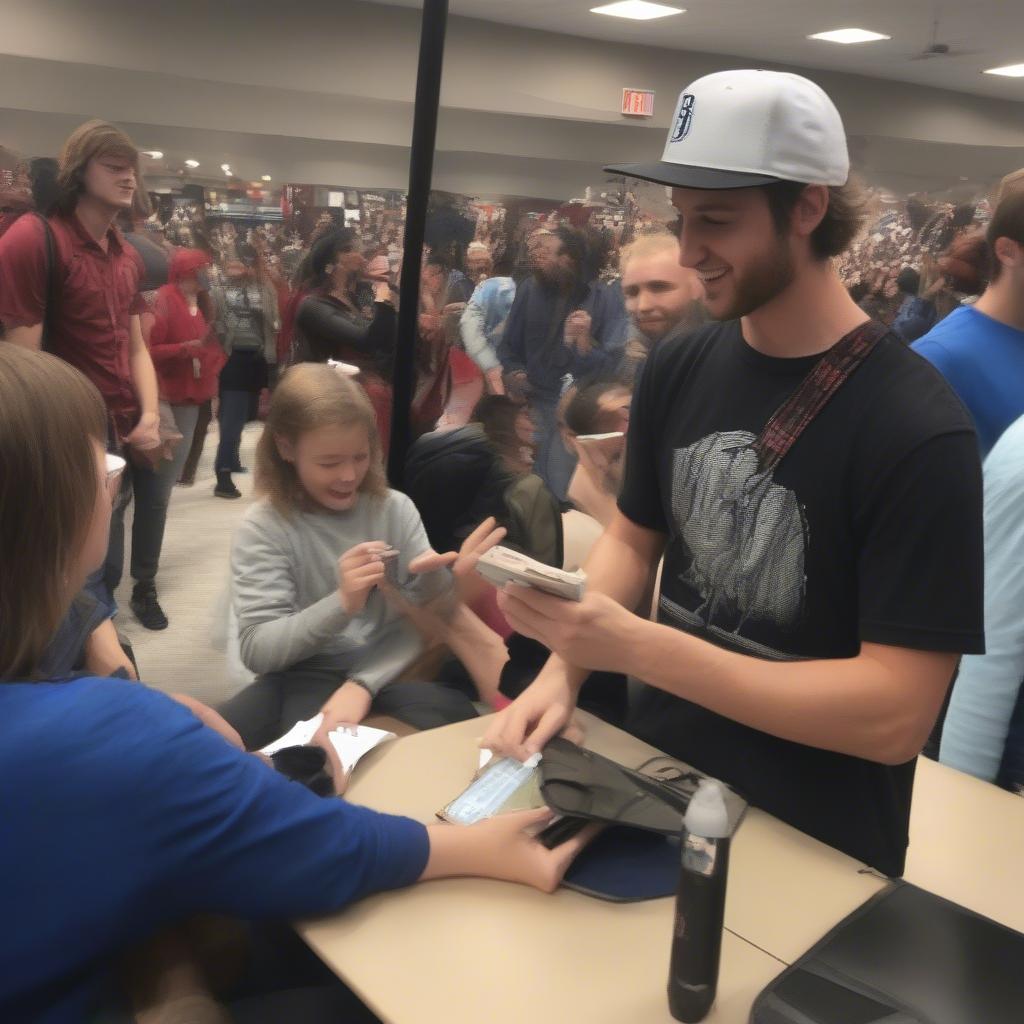 Bailey Zimmerman meeting fans and signing autographs