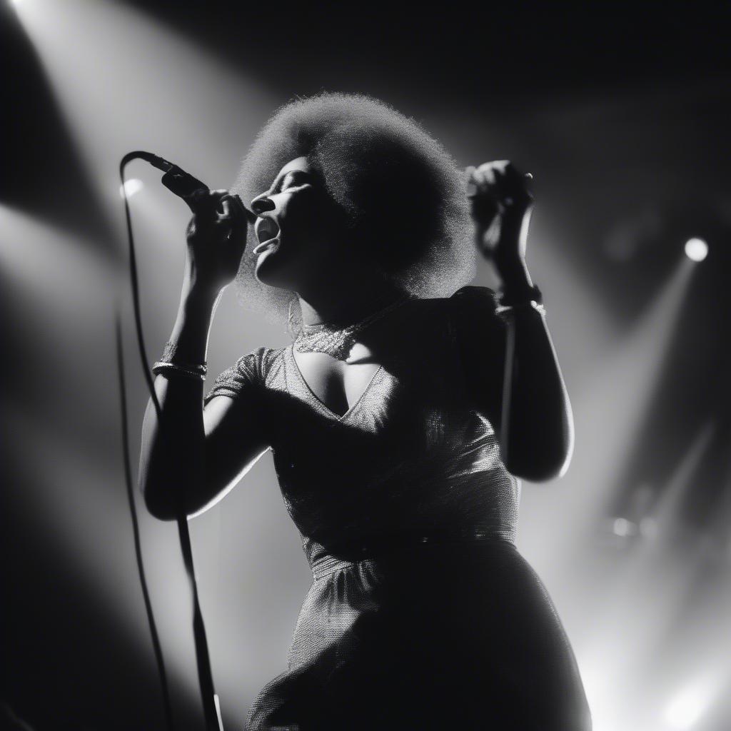 Oldie Soul Music Live Performance: A captivating black and white photo of a soul singer passionately performing on stage with a microphone, surrounded by a band.