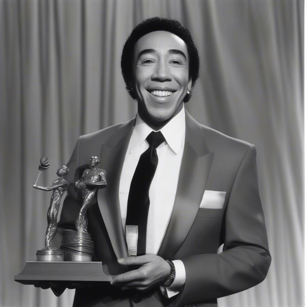 Smokey Robinson receiving a music award