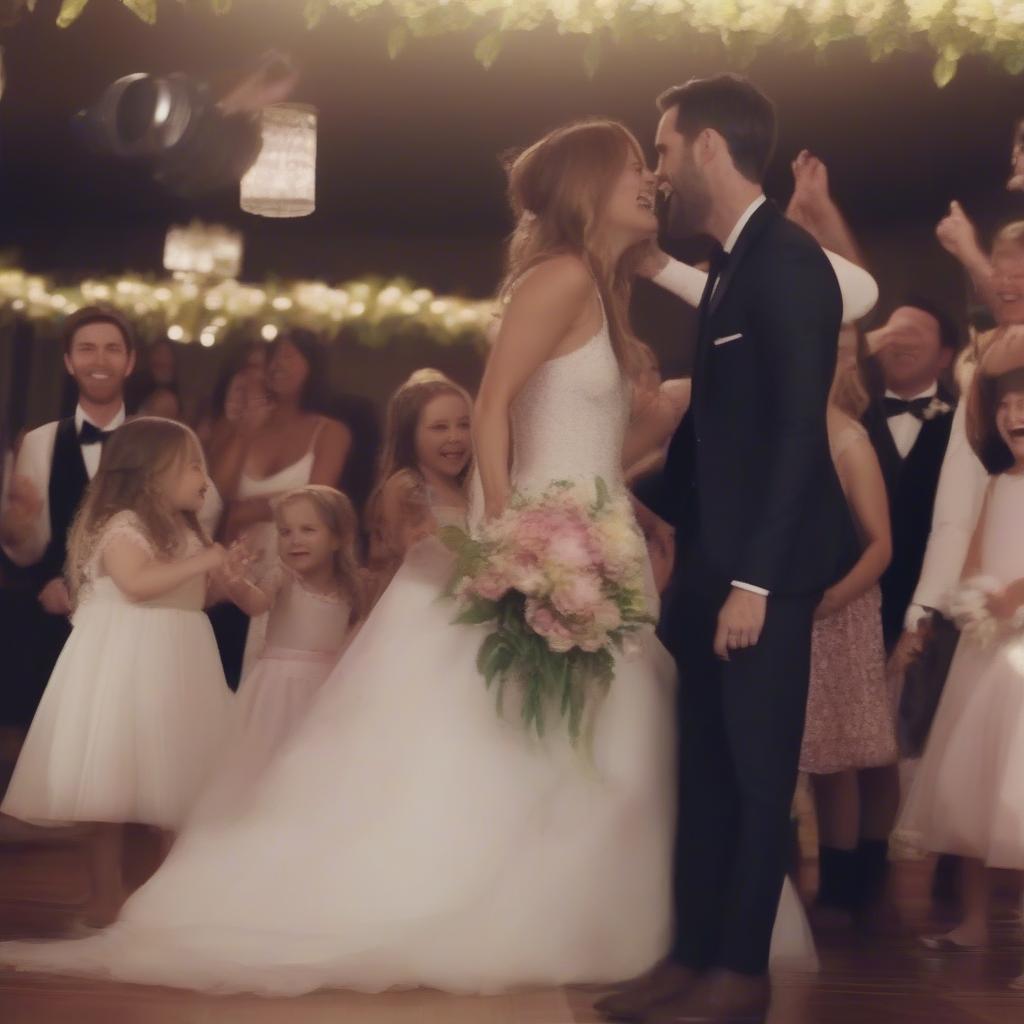 A still from the "Sugar" music video showing Maroon 5 surprising a wedding couple