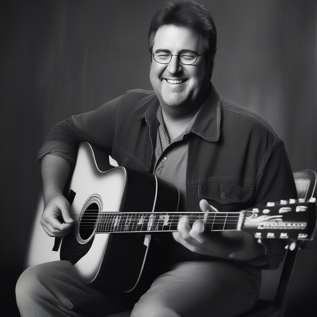 Vince Gill playing an acoustic guitar